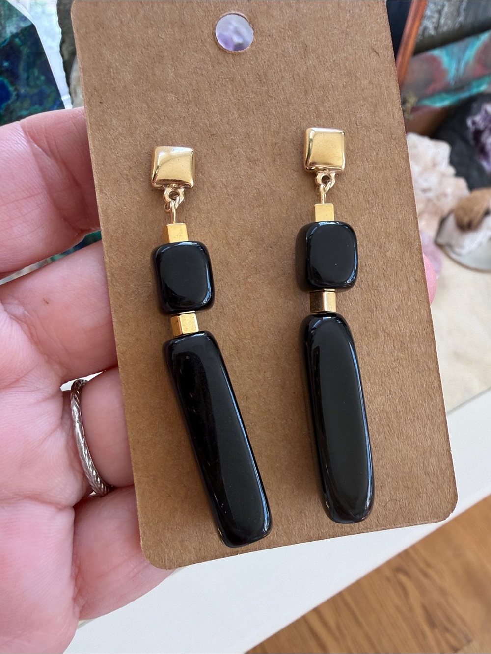 Elegant Black Drop Earrings with Gold Accents